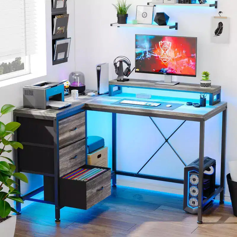 L-förmiger Gaming-Schreibtisch (47.3) Wendbarer Eckschreibtisch mit 3 Schubladen, Steckdosen und USB-Anschluss für das Home Office (1er-Pack)